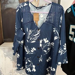 Blue flowing blouse.